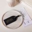 Katie Loxton Sentiment Luggage Tag Explore Dream Discover - Black